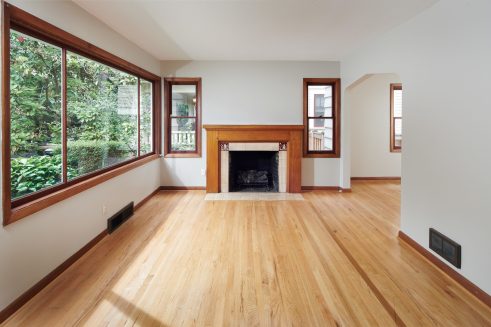 living room with hardwood floors and fireplace