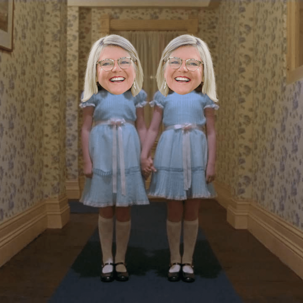 Twins from The Shining movie in matching blue dresses and knee socks with Susie's face on each one's head