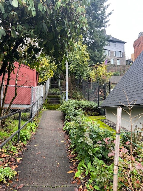 A sidewalk section that leads to the Alameda stairs