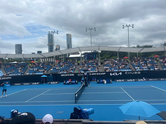 View from the crowd of the tennis court at the Australian Open
